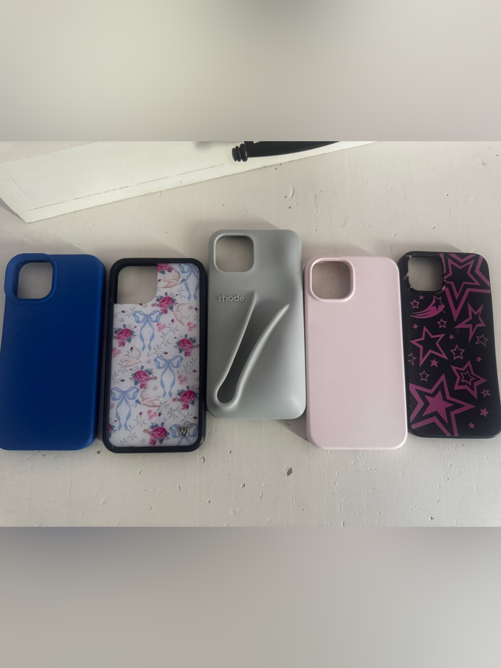 5 iPhone-14 cases: RHODE lip balm case, WildFlower